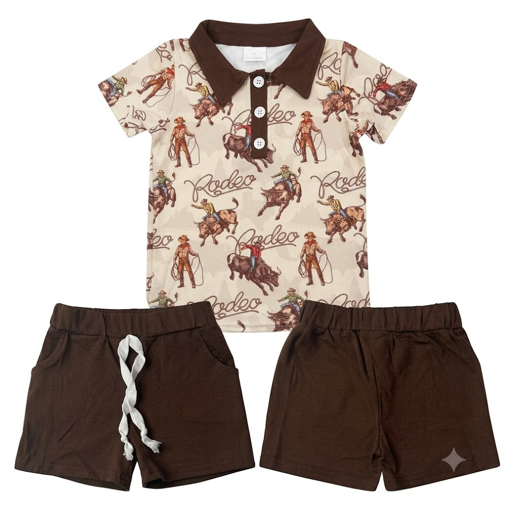 A toddler boy's two-piece clothing set featuring a short-sleeve polo shirt with a brown collar and button placket, covered in a western 'Rodeo' cowboy print on a beige background, paired with solid dark brown shorts.