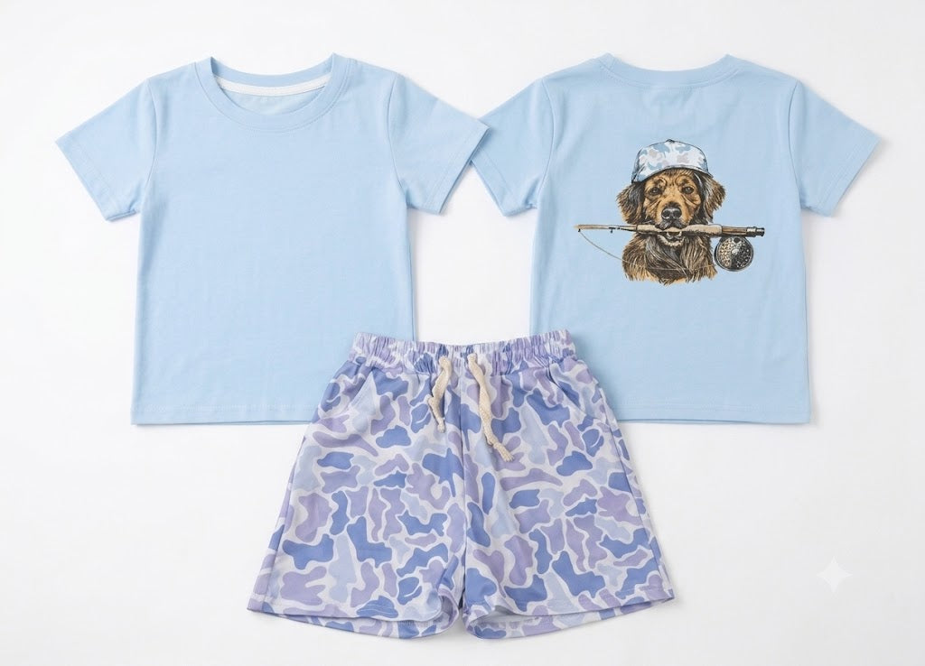 Children's light blue short sleeve tee with golden retriever fishing graphic on the back, paired with blue camo drawstring shorts — front and back view