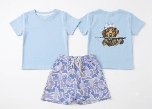 Children's light blue short sleeve tee with golden retriever fishing graphic on the back, paired with blue camo drawstring shorts — front and back view